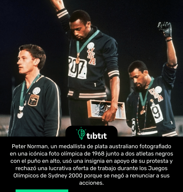 Peter Norman, un medallista de plata australiano fotografiado en una icónica foto olímpica de 1968 junto a dos atletas negros con el puño en alto, usó una insignia en apoyo de su protesta y rechazó una lucrativa oferta de trabajo durante los Juegos Olímpicos de Sydney 2000 porque se negó a renunciar a sus acciones.